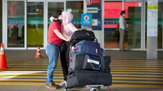 Mandatory Credit: Photo by JOSE JACOME/EPA-EFE/Shutterstock (10682062d) A couple hugs at Mariscal Sucre International Airport in Quito, Ecuador, 16 June 2020. Several foreign airlines have already resumed their flights with Ecuador or announced that they will do so in the short term, all under special programs, while the country is gradually resuming operations despite the coronavirus pandemic. More airlines resume flights with Ecuador under special programs, Quito - 16 Jun 2020