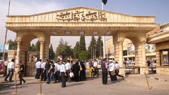 Syrian university students gather on October 2, 2012 at the entrance of Aleppo University Campus, as universities are reported to be functioning despite the ongoing conflict between rebel fighters and Syrian government forces. UN-Arab League envoy Lakhdar Brahimi told the UN Security Council that the Syrian civil war is worsening, but said President Bashar al-Assad only wants a return to the "old Syria." AFP PHOTO/STR (Photo credit should read -/AFP/Getty Images)
